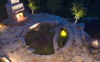 Stone patio and fireplace, fun geo-meteric design of two concentric circles overlapped.