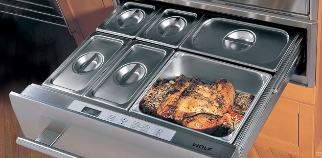thanksgiving kitchen essentials, appliances, kitchen design, The superior air control of the Wolf Warming Drawer helps keep moist foods moist and crisp foods crisp In addition to stainless steel an integrated drawer front allows for a custom wood panel and handle hardware