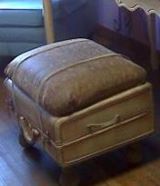 repurposed samsonite suitcase to footstool, painted furniture, repurposing upcycling, I cut a piece of plywood just smaller than the suitcase and drilled holes through both to attach wooden porch post finials for the feet