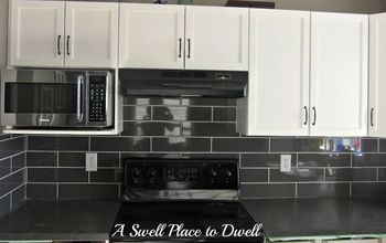 Thanks for all of your comments on which way to lay the tile....here's our new tile backsplash.