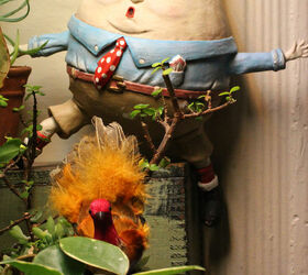 thanksgiving decor using a cast of characters part three, crafts, seasonal holiday decor, thanksgiving decorations, Ruffled Feathers seen here with Humpty Dumpty a permanent resident in my succulent garden