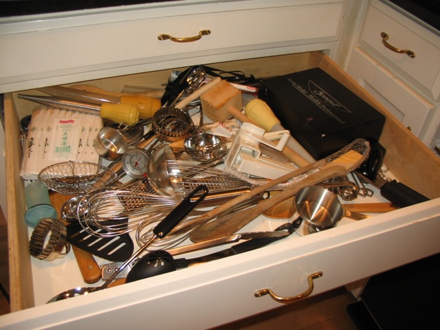 kitchen drawer organizing, kitchen design, organizing, Many people have kitchen drawers that look like this