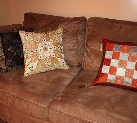 transforming a living room with colorful pillow covers amp placemats, home decor, living room ideas, Shiny velvet sparkle hand embroidered pillow along with a coffee brown pillow cover on one side and The Game of Chess Golden orange pillow cover on the other side