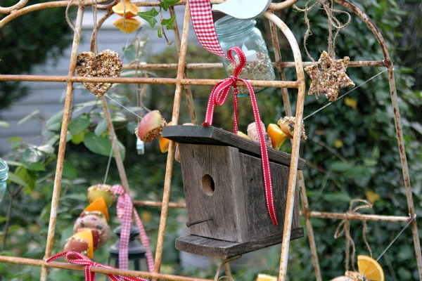 vintage recycled bird feeder, gardening, painted furniture, repurposing upcycling, A small birdhouse and bird seed ornaments