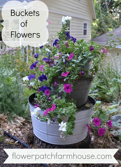 buckets of flowers, flowers, gardening, stacked galvanized bucket planter