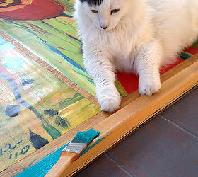how to frame huge prints inexpensively, diy, how to, painting, wall decor, woodworking projects, I painted the frame turquoise and painted the exposed plywood backing a lime color This step requires very close supervision by Crafty Cat I think I did okay