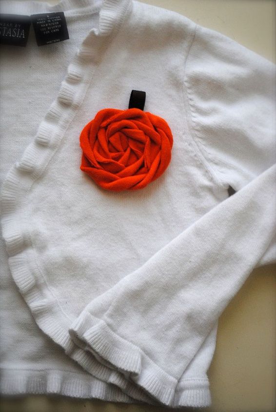 pumpkin rolled fabric rosette, crafts, Pinned to a cardigan