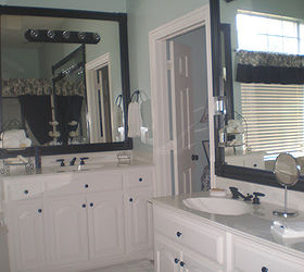 spray paint bathroom fixutres yes, bathroom ideas, home decor, painting, Wood trim around the mirrors added so much punch to the bathroom
