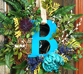 diy interchangeable wreath, christmas decorations, crafts, seasonal holiday decor, wreaths, Hang the wreath with your ribbon When it s time for a seasonal change pull out the flowers and centerpiece and replace them with something more appropriate for the season It s quick and easy