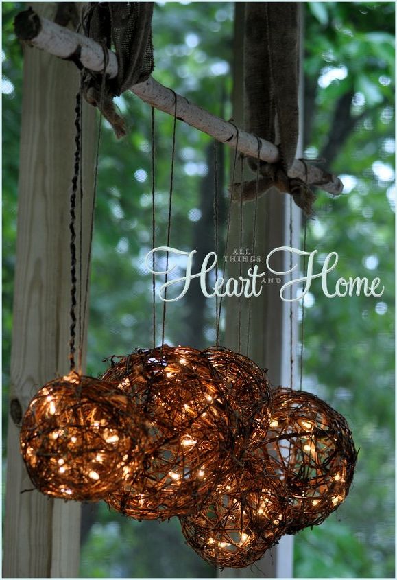 easy diy outdoor light, lighting, outdoor living, I ran the cord up the twine and connected it to a white extension cord that I hid between one of the loops of burlap ribbon which holds the branch the other end of the burlap ribbon is attached to the ceiling w eye hooks