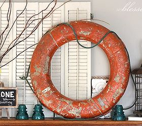 vibrant amp happy summer mantel, home decor, seasonal holiday decor, This life preserver ring was a yard sale find for 5