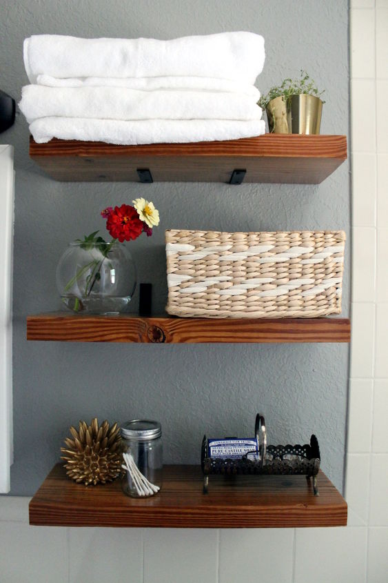 70 bathroom makeover, bathroom ideas, home decor, repurposing upcycling, shelving ideas, small bathroom ideas, Create faux floating shelves by using corner brackets as shelf brackets I saved money by using reclaimed wood found at an estate sale