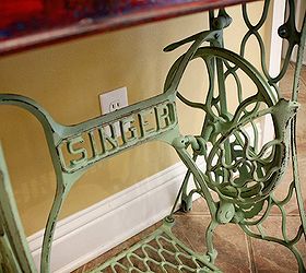 repurposed red wagon sewing machine base storage table, painted furniture, repurposing upcycling, An antique Singer sewing machine base with distressed green paint serves as a solid base Repurposed Red Wagon Sewing Machine Base Storage Table by GadgetSponge