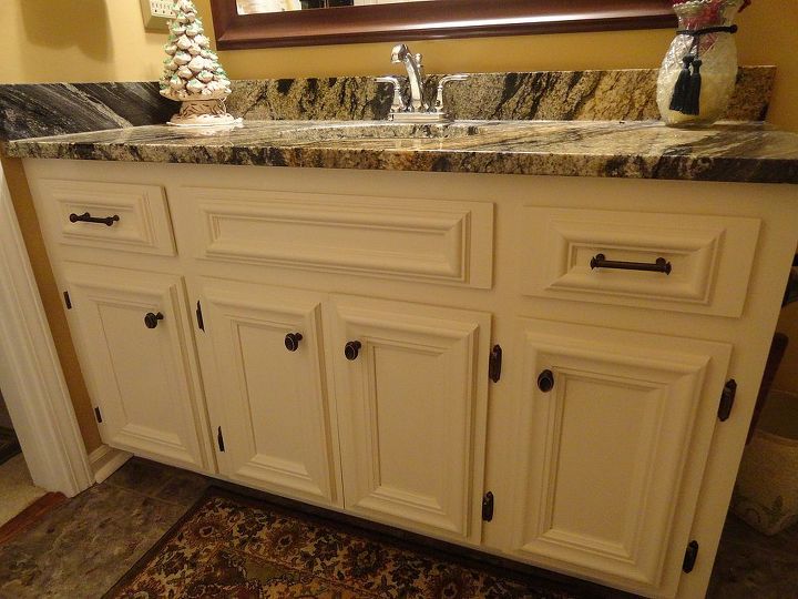 bathroom vanity, bathroom ideas, diy, painted furniture, Chair rail applied to doors Changed hinges and pulls and painted