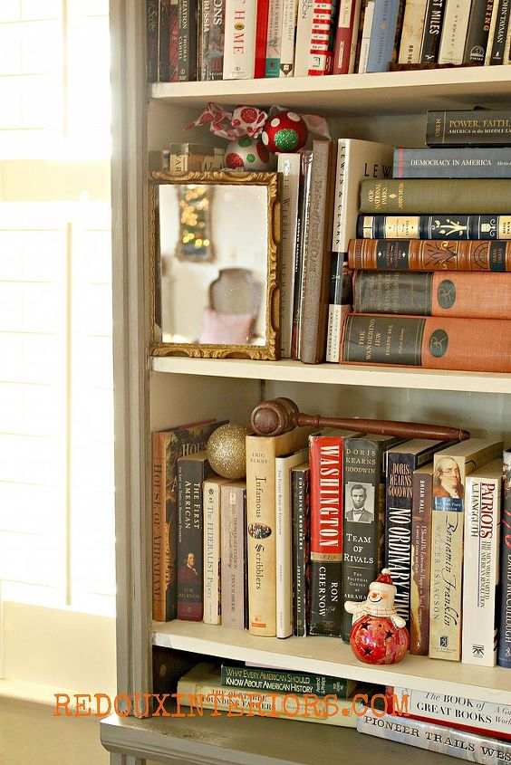 keeping it real holiday home tour, christmas decorations, seasonal holiday decor, Bookshelf turned closet organizer gets a festive feel with a few Christmas touches