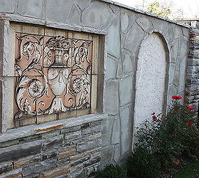 architectural antiques for the garden, architecture, concrete masonry, outdoor living, A poly chromed terra cotta freize from the late 1800s which came from a historic building in Chicago The six piece panel was tiled into the garden wall in my backyard