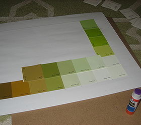 diy paint chip art, home decor, painting, Gluing them down overlapping such a way that the color names still show