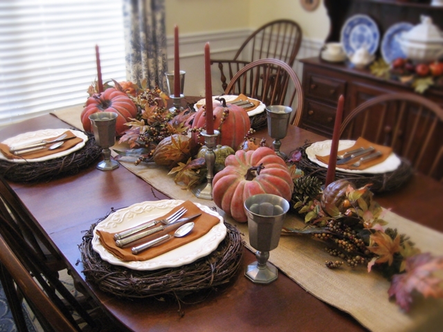confessions of a plate addict s fall home tour, seasonal holiday d cor, Fall s harvest bounty on the dining room table with grapevine chargers and pewter flatware and goblets for a rustic look