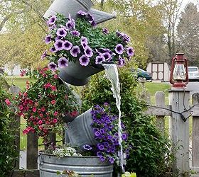 annie s galvanized tipsy pots, container gardening, flowers, gardening, outdoor living, ponds water features, repurposing upcycling, Add a pump and flowers
