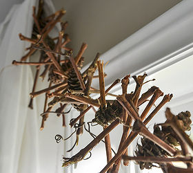 make a rustic grapevine pinecone christmas garland for free, christmas decorations, seasonal holiday decor, This rustic take on a seasonal garland is beautiful and neutral enough to hang all year around