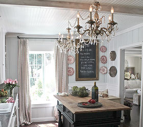 french country cottage kitchen, Vintage chandeliers vintage french ticking drapes and a new but vintage inspired island