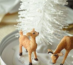 diy holiday waterless diorama style snow globes, crafts, seasonal holiday decor, Do the same thing with the base of your animals or any other small trinkets you would like to place inside the jar