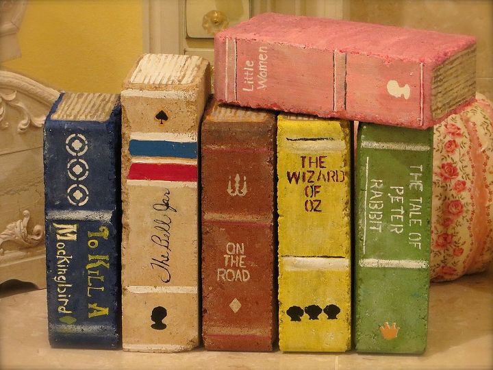 painted brick books, crafts, painting, Used just ordinary bricks Found this one taller filler brick I have seen them with bricks with holes but I had these Looked at pics of old books for ideas Painted gold or brown lines for the pages