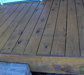 sealing your wood deck for years of enjoyment, decks, home maintenance repairs, how to, Got to love builders that leave those grade stamps facing up we got a few tricks to help eliminate them linked above in this case the homeowner decided to simply leave them