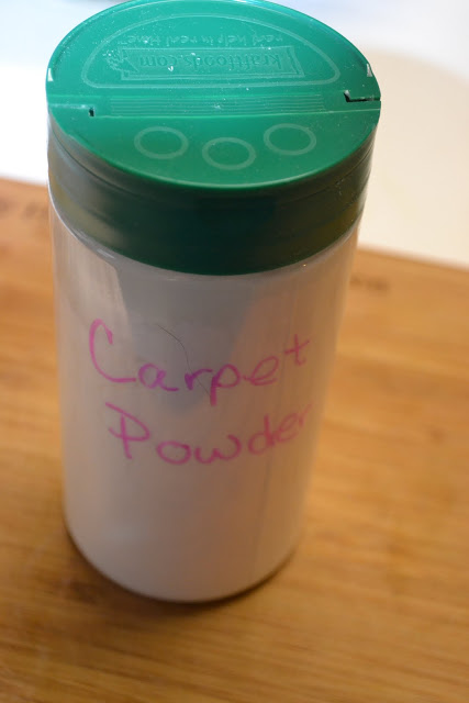 homemade carpet powder, cleaning tips, flooring, An empty Parmesan cheese container makes the perfect container for homemade carpet powder
