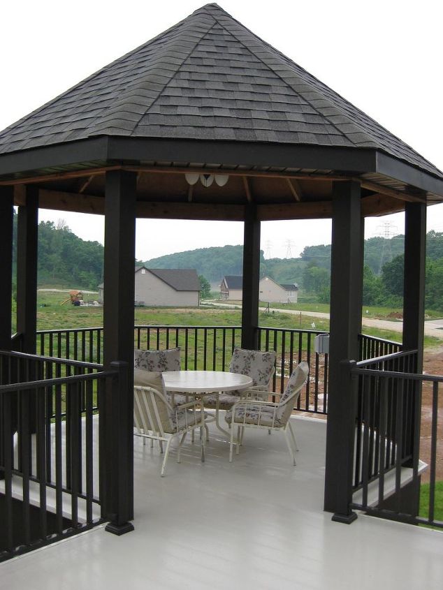 q decks come in all shapes and sizes like this curved deck built with ariddek aluminum, decks, home decor, outdoor living, patio, This home created a beautiful and unique deck and gazebo using AridDek aluminum decking Because AridDek is waterproof decking the area below stays dry as well