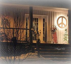 christmas was simple and calm for us this year, christmas decorations, seasonal holiday decor, Our simple front porch that peace sign glowed all over the property