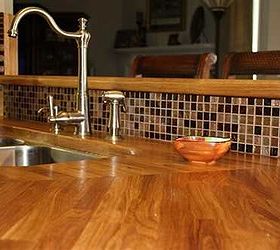 tiling cheat amazing tiling effects using self adhesive wall tiles, kitchen backsplash, kitchen design, tiling, wall decor, a metallic look really blends well in this wood kitchen