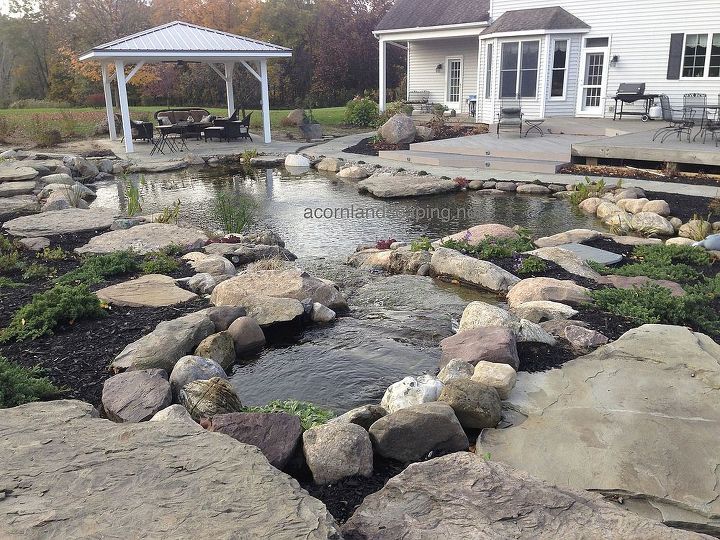 water gardens rochester ny fish ponds, landscape, ponds water features, Check out this stunning oasis we recently created located at a private residence in Rush NY Monroe County about 20 minutes from Rochester NY This backyard makeover included a Waterfall Pond renovation LED Lighting Pergola Plants