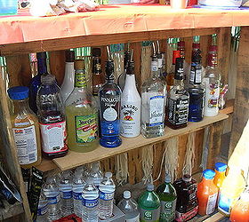 building a tiki bar from pallets, adding the shelf helped alot in supporting the bar not to mention ALL that booze