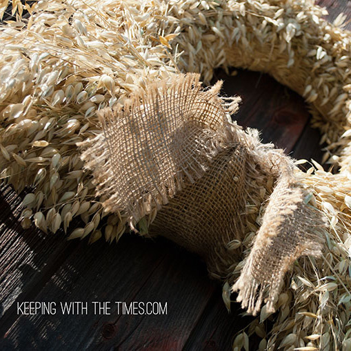 a tutorial on how to make a rustic country oat wreath, crafts, repurposing upcycling, seasonal holiday decor, wreaths, Use a simple piece of burlap as a bow