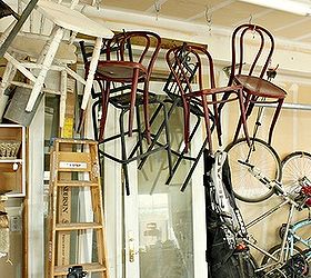 organize your garage using reclaimed and upcycled items, garages, organizing, repurposing upcycling, Hang chairs from the ceiling on the sides of your garage This frees up precious floor space