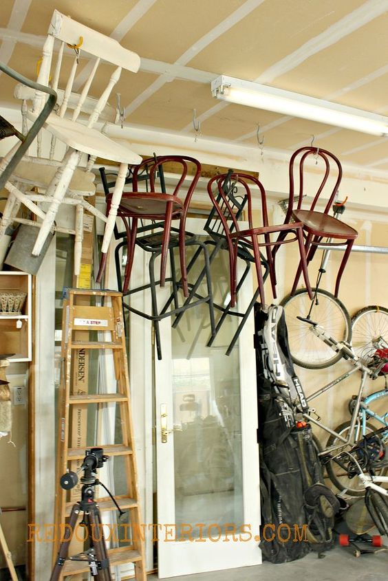 organize your garage using reclaimed and upcycled items, garages, organizing, repurposing upcycling, Hang chairs from the ceiling on the sides of your garage This frees up precious floor space
