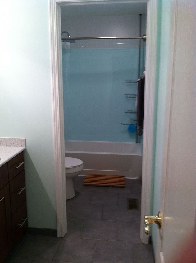 spare bathroom remodel under 4 000, bathroom ideas, home decor, home improvement, Shower area from hallway door