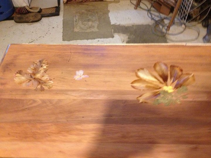 decoupaging pressed flowers on furniture, top of buffet with pressed flowers layed out
