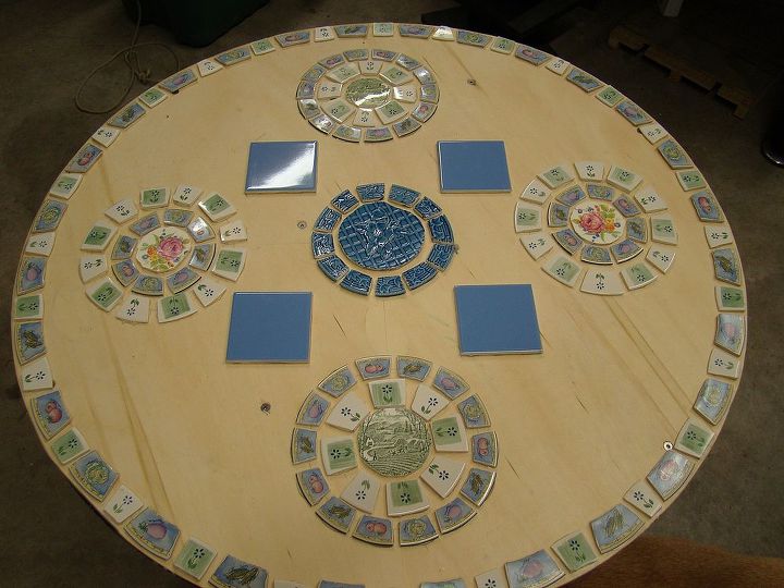 mosaic table for the patio or garden, outdoor furniture, painted furniture, tiling, Added my place settings and a tile for drinking glass or tea cups