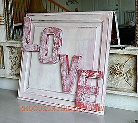 love sign made from an old cabinet door, crafts, painting, repurposing upcycling, seasonal holiday decor, valentines day ideas, I used a thin coat of Vintage White and dry brushed the letters