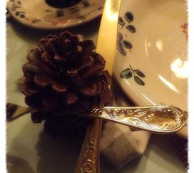 a fall table setting full of whimsy, home decor, I used my favorite dishes from The Country Door The pinecone holds the fork and knife between the slats