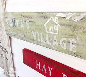 a tree farm inspired sign wall in the mudroom, christmas decorations, laundry rooms, painting, seasonal holiday decor
