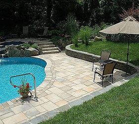pool patio too hot concrete paver slabs look like stone with low heat, Stacked stone walls hold back the lawn and lush plantings