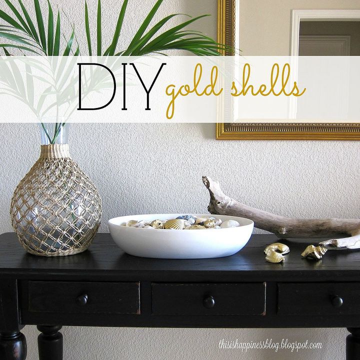 diy gold seashells, crafts, seasonal holiday decor, Created a summer vignette on my front entry table using driftwood rattan vase with palm leaves and seashells