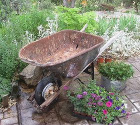 how to plant a rusty wheelbarrow for the garden, gardening, repurposing upcycling, All ready to plant I used landscape fabic to line the barrow too many bullet holes in this one