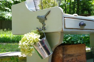 the perfect piece for a porch, flowers, gardening, outdoor furniture, painted furniture, repurposing upcycling, An iron bird hook is the perfect spot to hang flowers garden tools or a hand towel