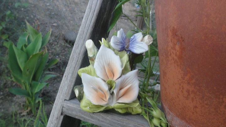ladder shelves, gardening, repurposing upcycling, shelving ideas, this is a nite lite cover with a little butterfly on it