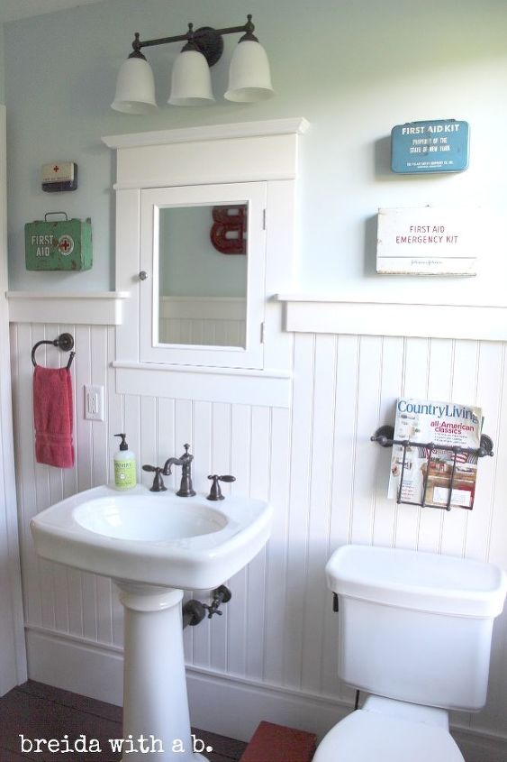 historic farmhouse bathroom renovation, bathroom ideas, diy, home decor, Vintage Red Cross and First Aid Decor Custom trim and moldings