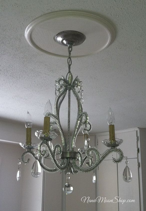 her home kitchen remodel, home decor, kitchen backsplash, kitchen design, kitchen island, Unconventional kitchen lighting this chandilier was purchased at Lowes It is the centerpiece of the whole kitchen an island will sit beneath it